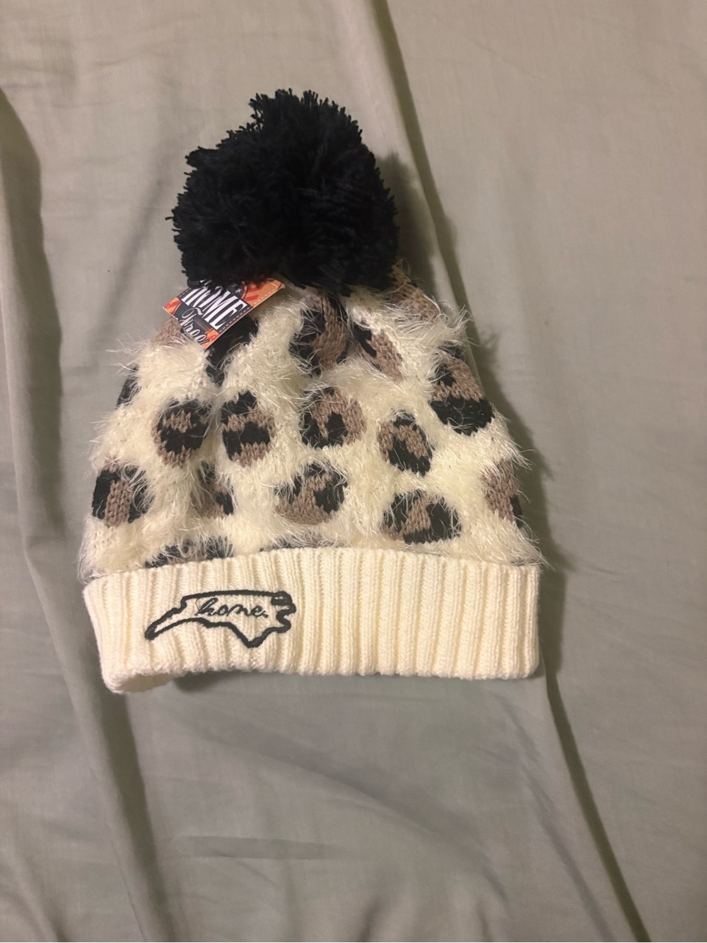Kids Fuzzy Leopard Pom Beanie - Cream, Black & Brown